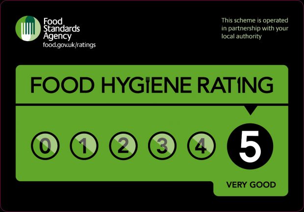 A food hygiene rating sticker showing a score of 5