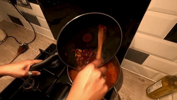 Someone cooking over a stove for The Great BHM2021 Cooking Challenge