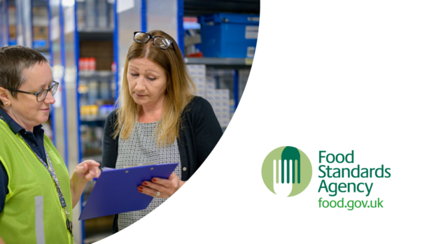 two people looking at a clipboard in a warehouse. Food Standards Agency logo in bottom right.