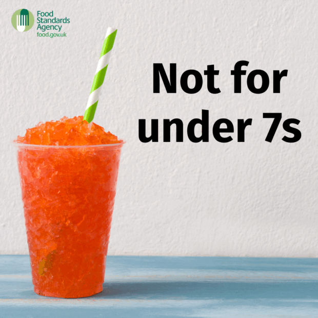 Not for under 7s. Cup of red slush ice drink. Food Standards Agency logo in top left.